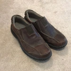 Brown leather loafers with black sole